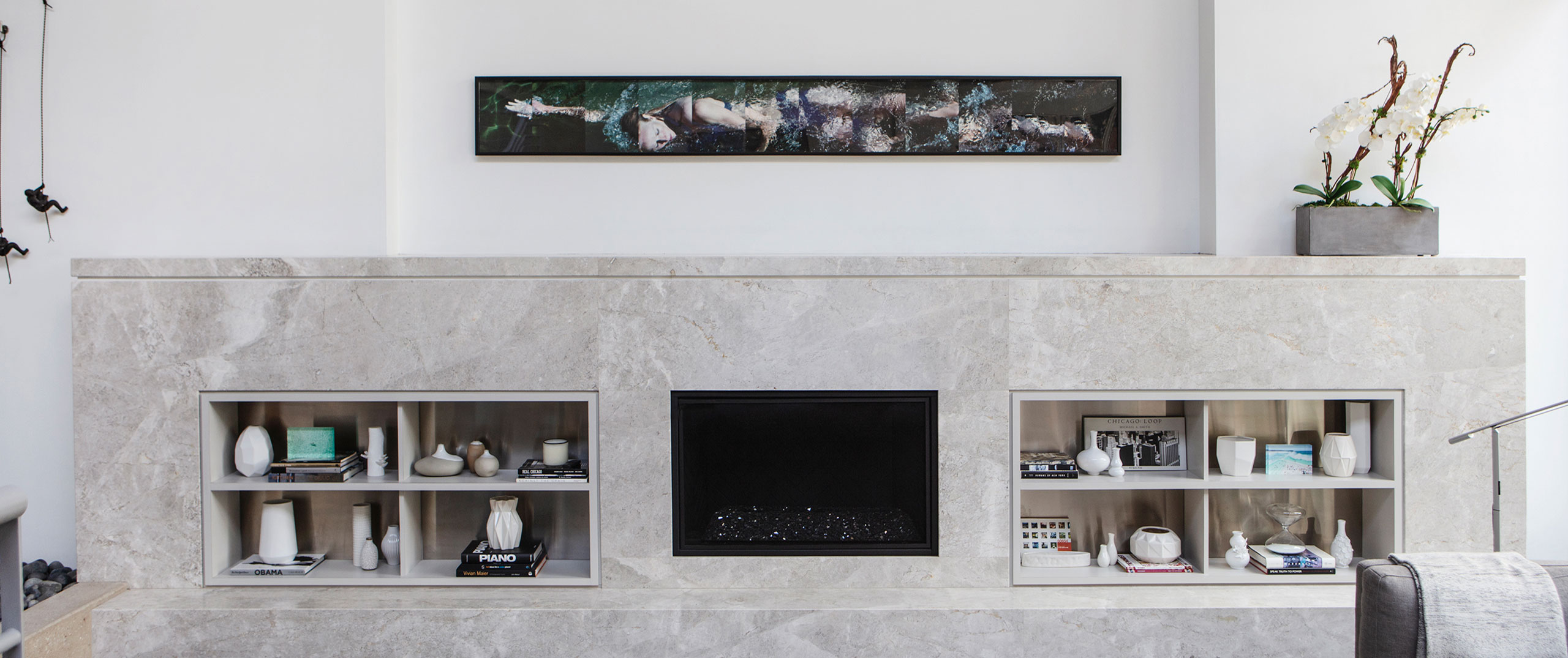 A sleek, modern granite fireplace